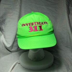 Investigate 311 trucker hat.